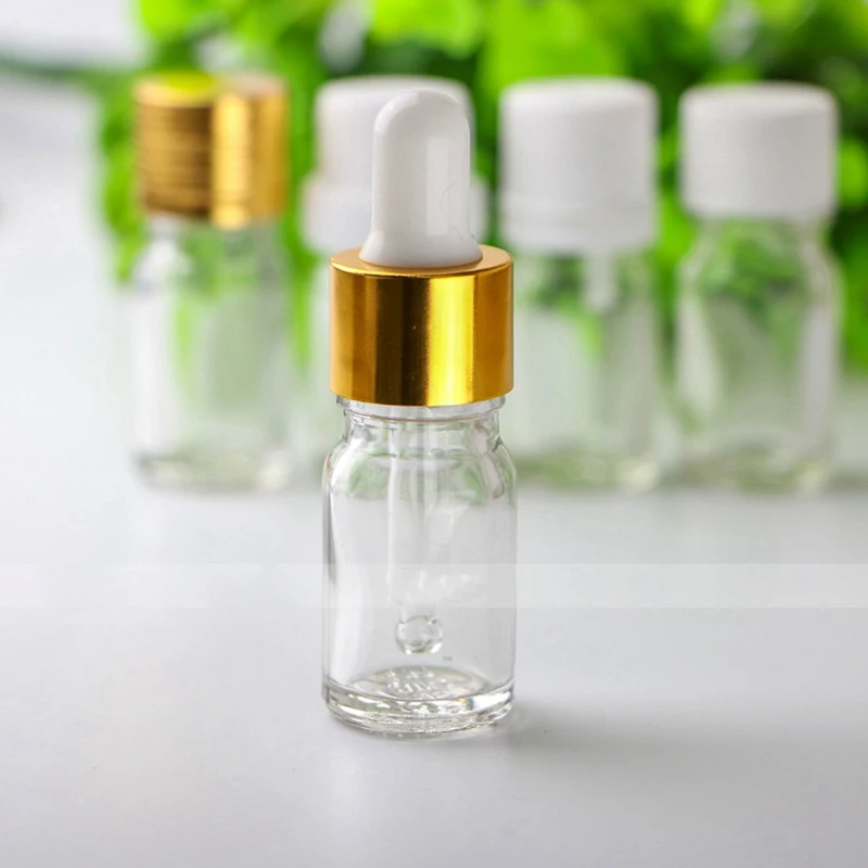 Wholesale Empty Glass Clear Dropper Bottle 5ml Glass E liquid Bottle With Gold Childproof Cap And Pipette For Sale