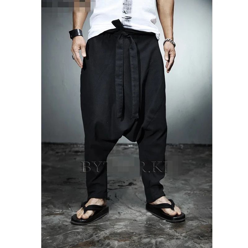 Korean youth hip hop men\'s low crotch fashion trend lace up casual pants Harem Pants linen pants loose personality