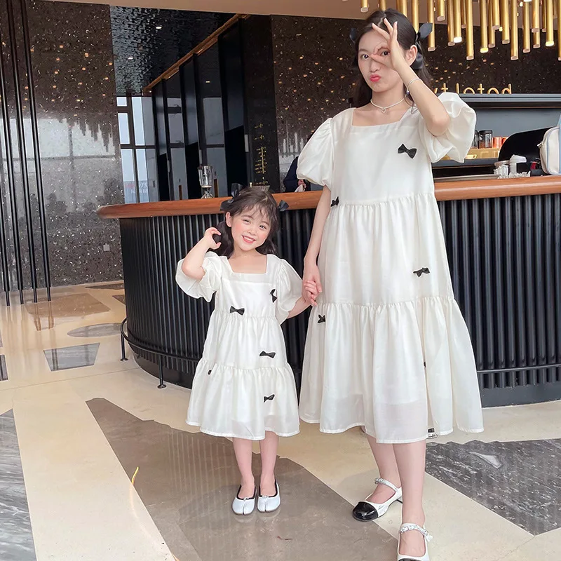 

Parent Child Dress 2022 Summer New Korean Bubble Sleeve Bow Mother Dress Princess Dress Mommy And Daughter Matching Clothes