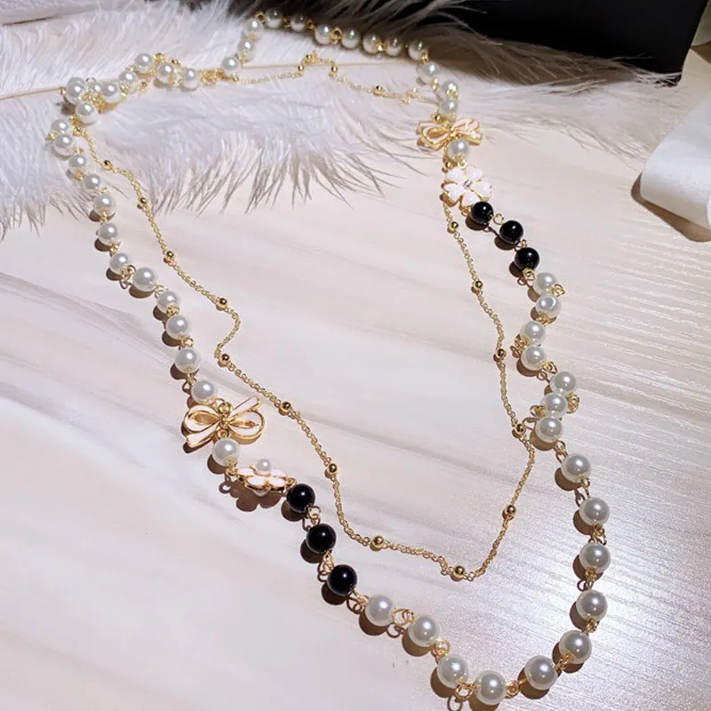 Famous Design Layered Pearls Beads Bow Flower Long Pendant Sweater Chain Necklace For Women