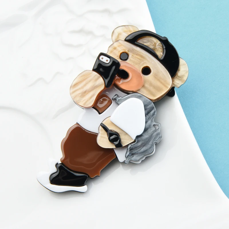 Wuli&baby Cute Acrylic Bear Brooch Take Picture By Phone Fashion Cute Animal Wearing Mansuit Sport Style Women Brooch Pins Gift