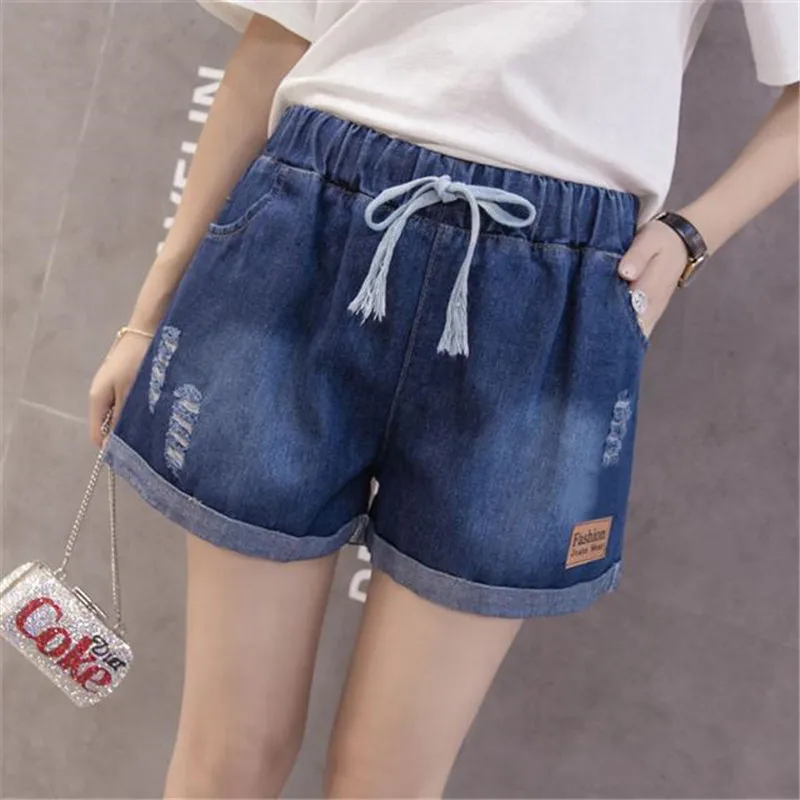 Summer fat mm plus fat plus plus size women\'s Elastic Waist Wide Leg loose hole jeans women\'s shorts trend