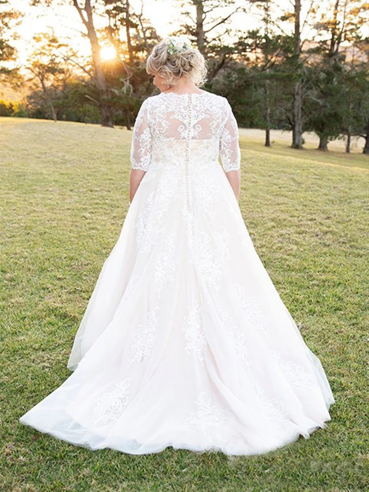 Robe de mariée élégante en dentelle bohème, grande taille, demi-manches, encolure dégagée, ligne A, jardin Boho