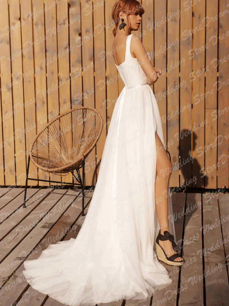 Abito da sposa da spiaggia personalizzato A Line 2025 per la sposa scollo a barca senza maniche senza schienale Sweep Train Robe De Soirée De Mariage