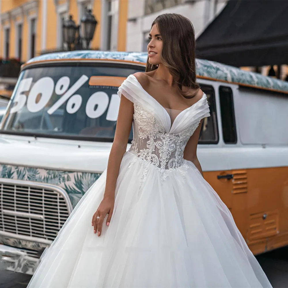 Ilusão tulle bola vestido de casamento vestido para noiva princesa simples decote em v fora do ombro boné mangas rendas até voltar vestido de noiva