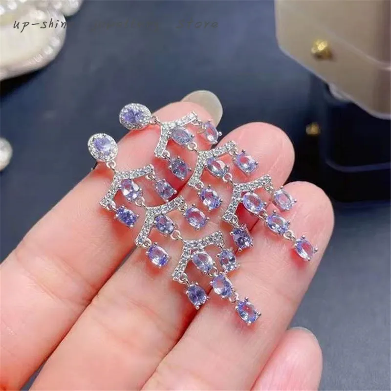 

New 925 silver inlaid natural tanzanite ear studs, the fire color is super good, new year gift, can be customized