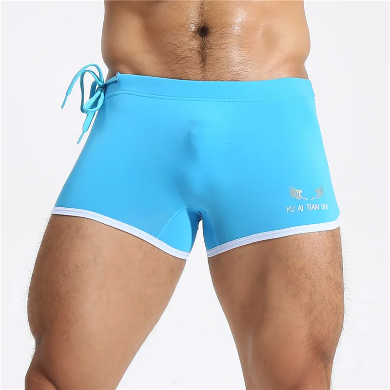 Pantalones cortos de primavera playa Boxers cortos de los hombres pijamas de verano Aro juventud deportes rápido seco casa flecha pantalones transpirables pantalones cortos