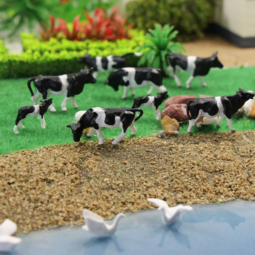 

Evemodel 32pcs Model Railway HO Scale 1:87 Painted Farm Animals Black White Cows 8 Different Poses P8714