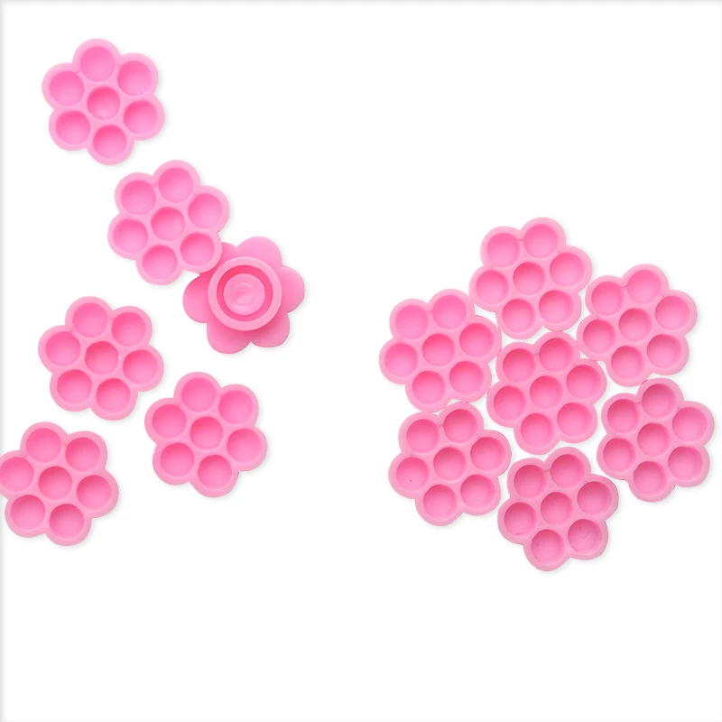 100 個まつげ接着剤ホルダーカップラッシュリフティング接着剤収納ツールまつげエクステンションブロッサム遅延容器メイクアップアクセサリー