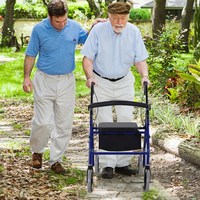HOMCOM adult Walker with adjustable seat and foldable footrest