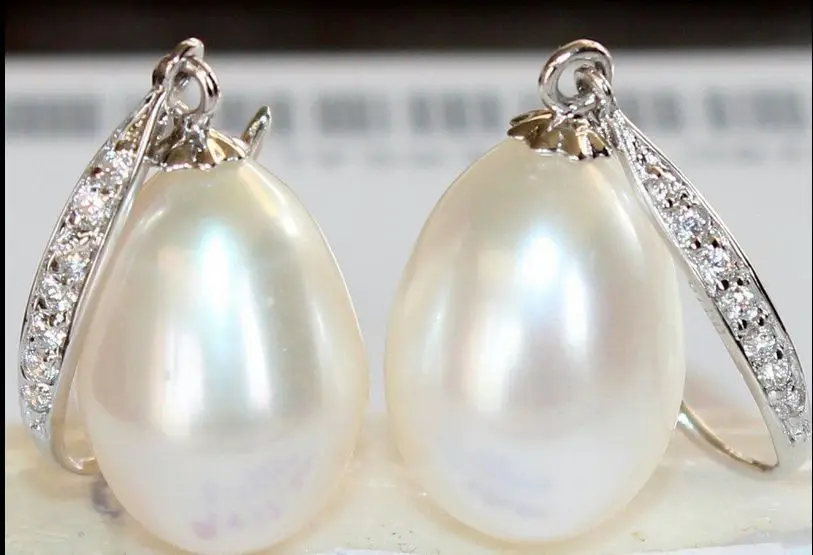 

a pair of natural 10-12MM Australian south seas white pearl earrings