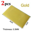 2 piezas de oro de 0.3 mm