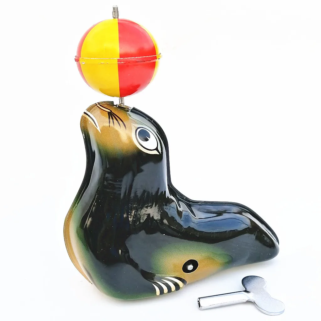 1PCS Tin Sea Lion Top Ball Chain Winding Dolphin Retro Collection Toys Wind Up Toys for Children