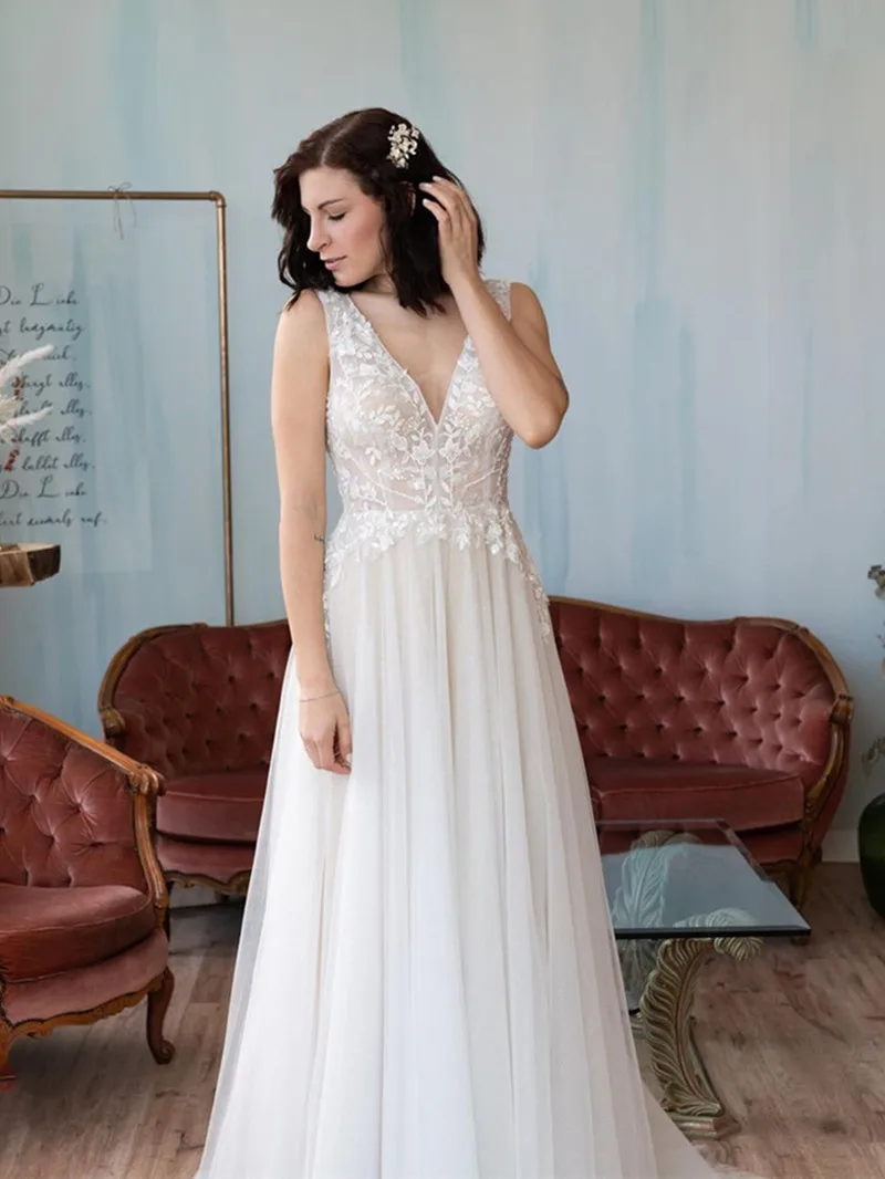 Abito da sposa semplice con scollo a v profondo 2024 Applique in pizzo senza schienale a-line senza maniche eleganti abiti da sposa per le donne Robe De Mariée nuovo