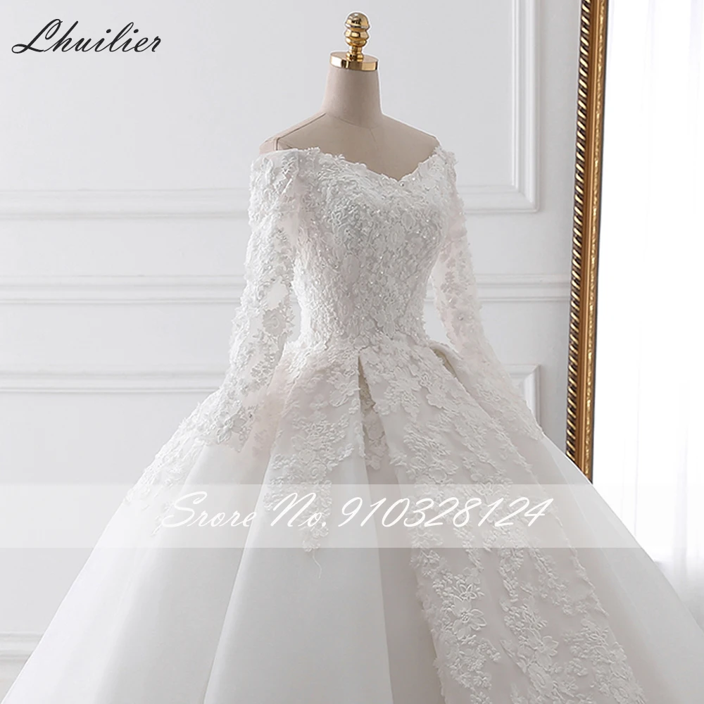 Lhuilier Abito da sposa in pizzo con scollo a V personalizzato Abiti da sposa in pizzo Lunghezza pavimento Maniche lunghe Abito da sposa con perline con strascico da cattedrale