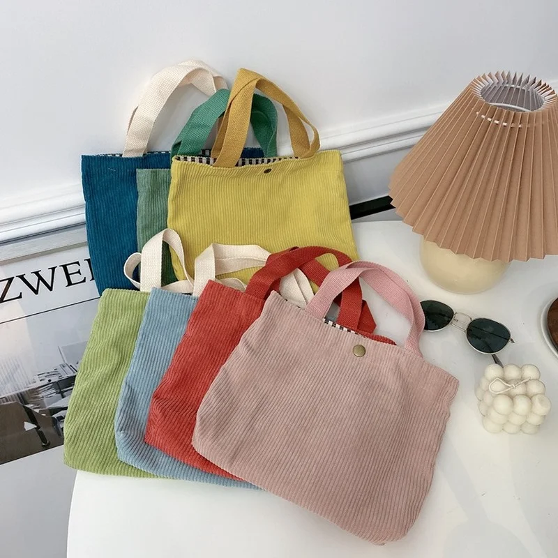 Bolso Retro portátil para mujer, bolsa pequeña de estilo universitario Morandi de Color, bolso de mano para cosméticos, bolso de pana para el almuerzo, monedero