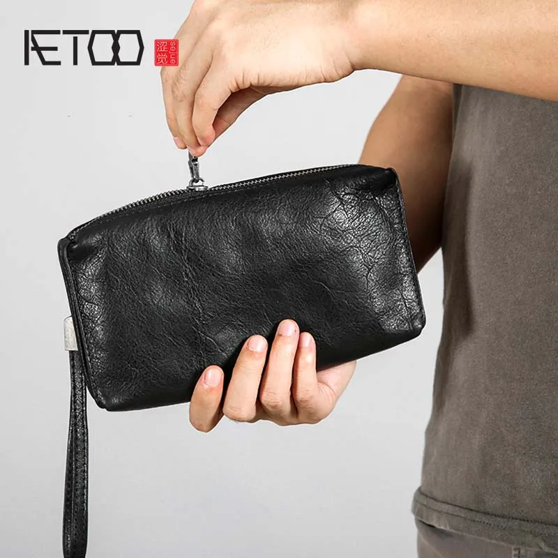 AETOO Leather retro wallet handbag men\'s hand clutch bag cowhide handmade casual retro leather bag zipper long wallet