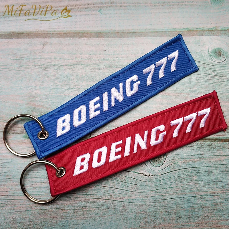 LLavero de teléfono con bordado azul Boeing 777 para hombre, 2 piezas, etiqueta de equipaje de la tripulación de vuelo, llavero rojo Boeing 777