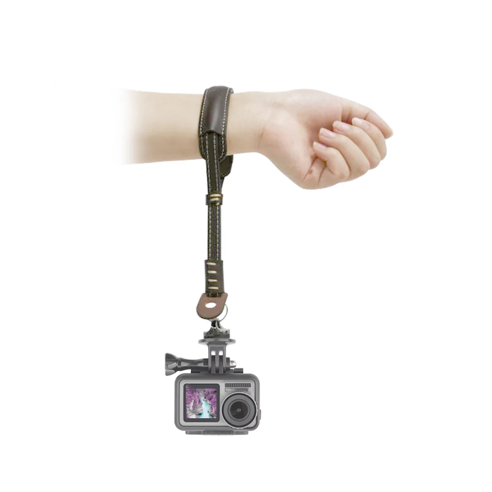 Boa qualidade aplicável para dji osmo ação couro do plutônio esportes câmera handheld correia de pulso cinta fixação