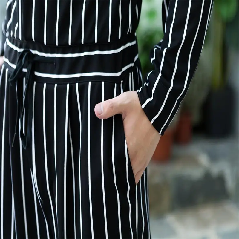 

Spring and autumn new Korean version of the tide male vertical striped jumpsuit overalls jumpsuit large size jumpsuit elastic wa