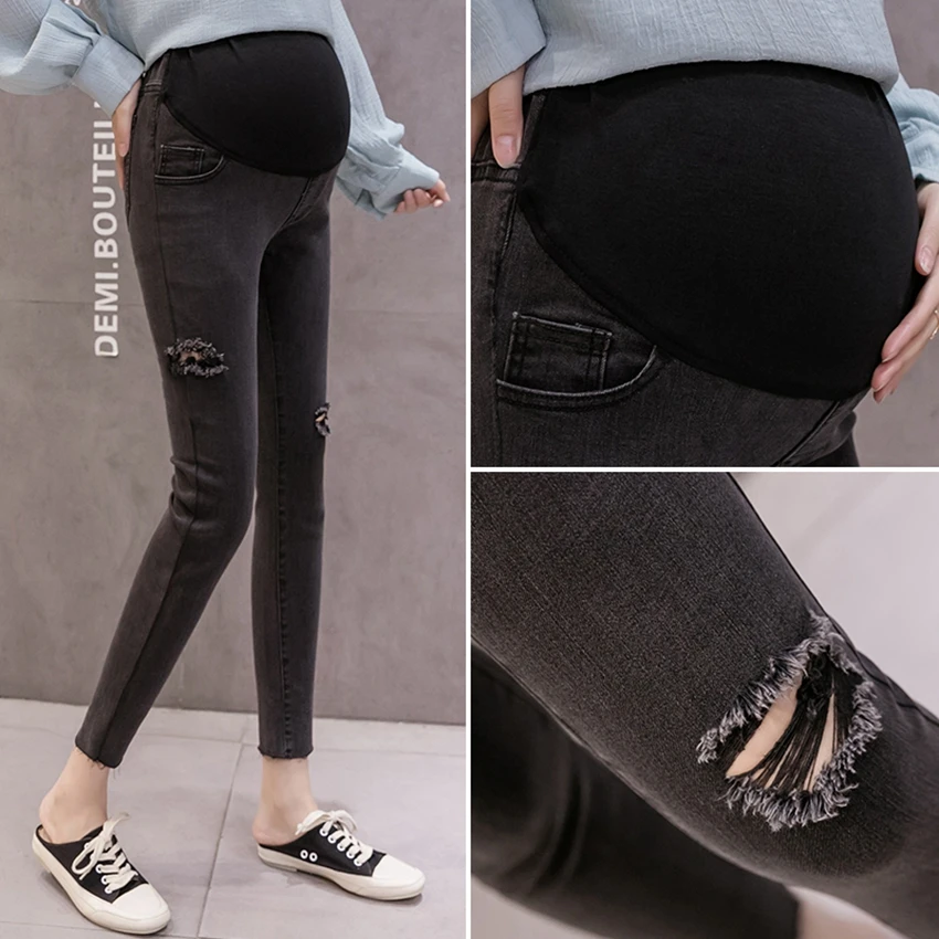 

Pregnant women's jeans spring and autumn models wear nine-point fashion ripped Korean version of pregnant women's feet pants