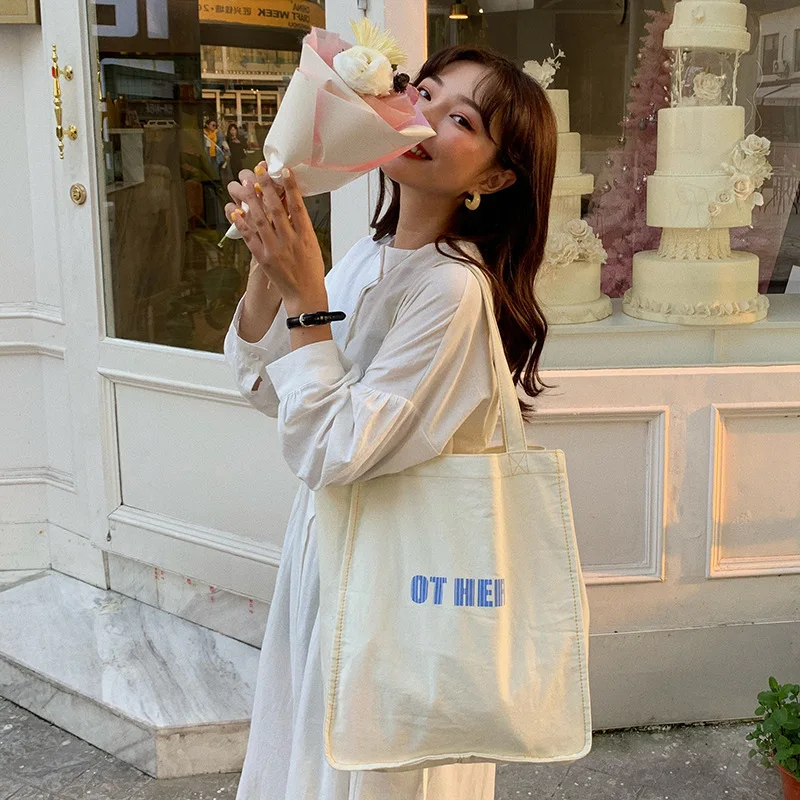 

Women canvas bag summer shoulder bag student book bag direct wholesale shopping bag letters cute tote bag