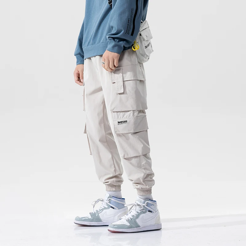 Calça de harem preto masculina, calça cargo, hip-hop, bolsos casuais, moletom extragrande, calça masculina na moda, streetwear, 2024