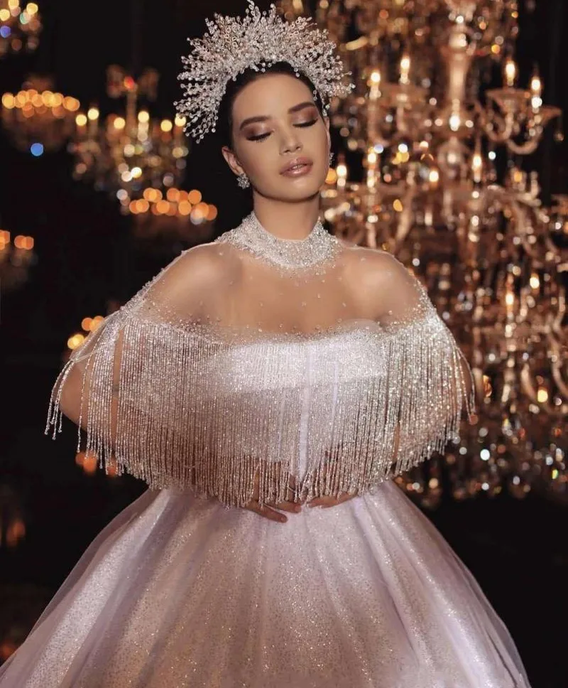 Abiti da sposa di lusso con paillettes scintillanti a collo alto con nappe abito da sposa Vintage con illusione di Dubai arabo saudita