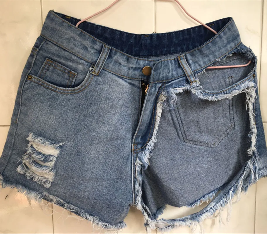 Pantaloncini caldi Sexy a vita alta in Denim afflitto a vita alta pantaloncini caldi da donna pantaloni corti strappati Jeans Vintage da donna Mini bottino