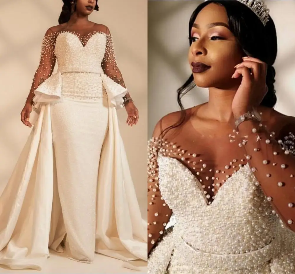 

2025 Customized African Mermaid Plus Size Wedding Dresses Overskirts Sheer Neck Long Sleeve Pearls Beaded Bridal Gowns