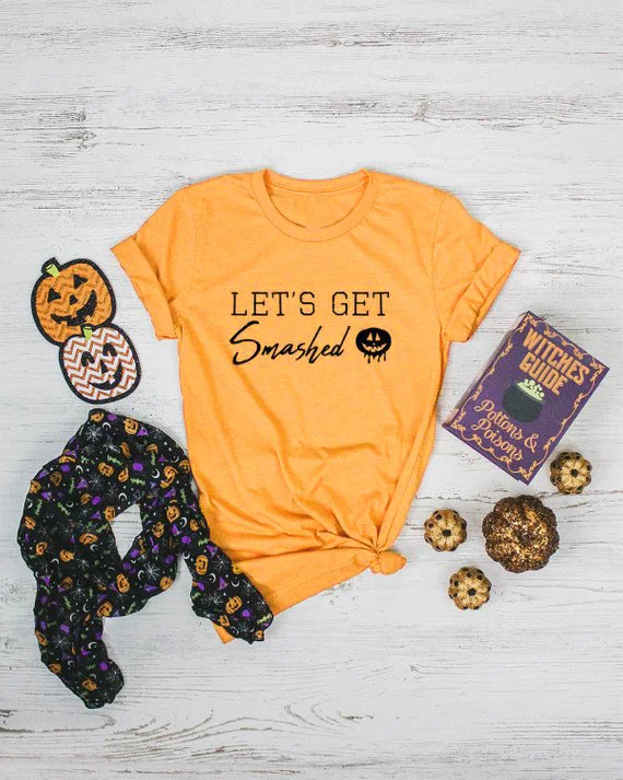 

Casual Slogan Graphic Top Stylish yellow 90s Halloween Outfits Halloween Holiday Tee Let's Get Smashed Pumpkin T-Shirt