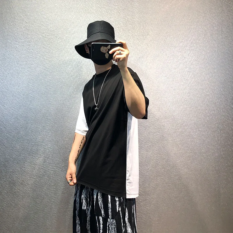 Men's black and white contrast hair stylist loose simple personality asymmetrical hem trend stitching large size T-shirt