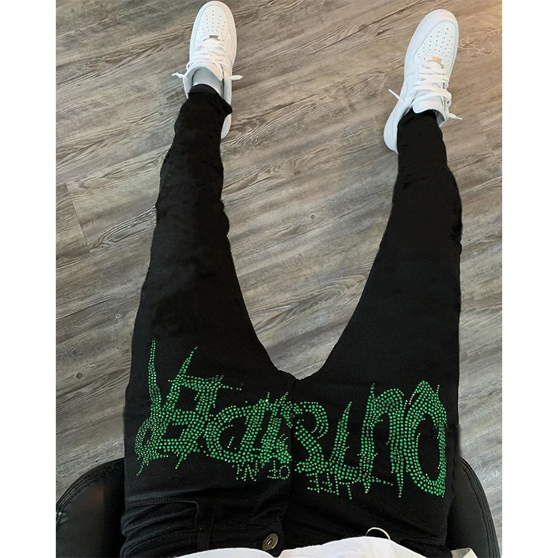 Nuovi uomini Trend Jeans strappati neri moda Street Hole pantaloni accogliente Skinny Design Hot strass Stretch pantaloni in Denim lavato morbido