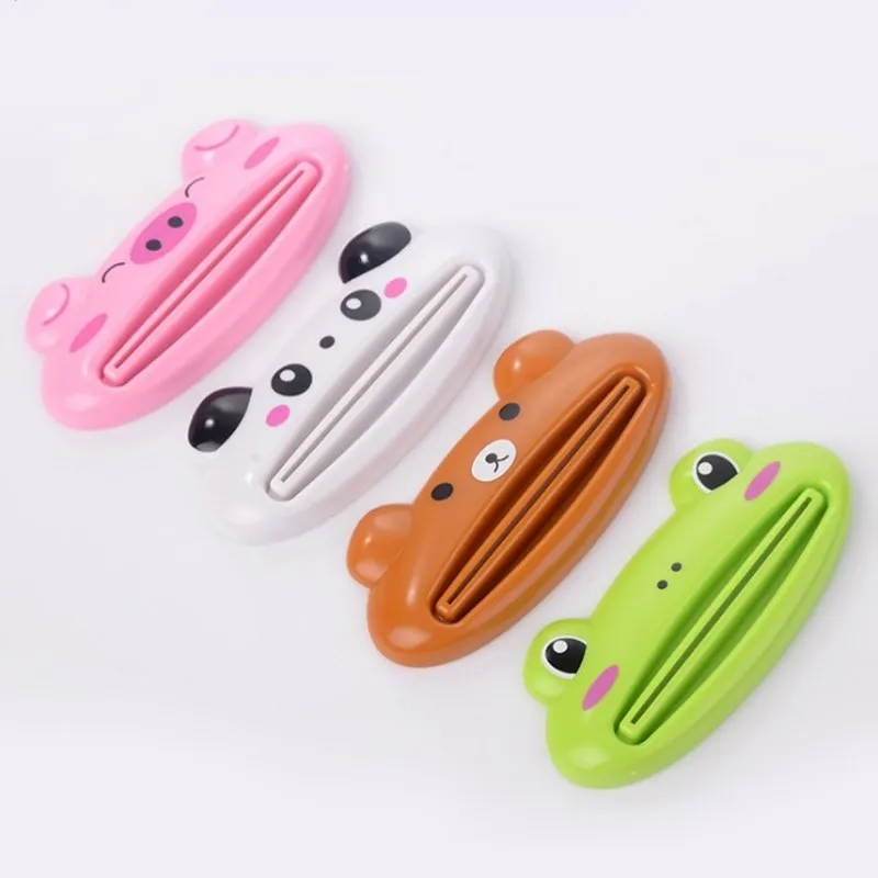 2 Pz/set Sveglio Creativo Del Fumetto di Plastica Facile Titolare Squeeze Tubetto di dentifricio Squeezer Rotolamento Pasta Set Da Bagno