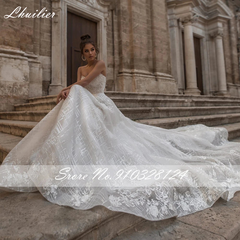 루이리에 맞춤형 A라인 스트랩리스 레이스 웨딩드레스 민소매 플로어 길이 브라이덜 가운 로열 트레인 포함