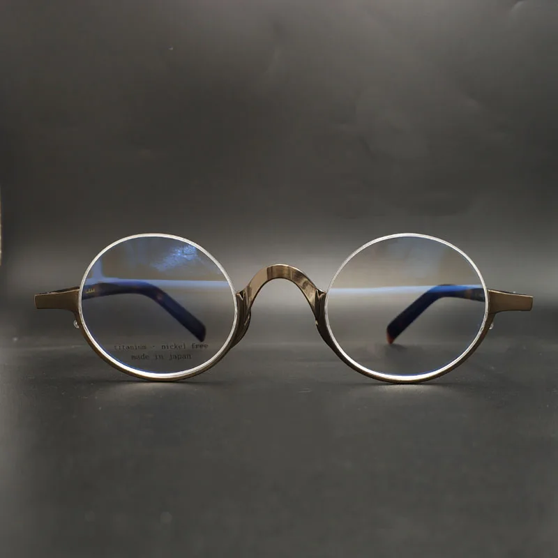 Gafas redondas pequeñas de metal de titanio para hombres y mujeres, montura óptica retro ovalada, montura inferior media, miopía, Vintage japonés