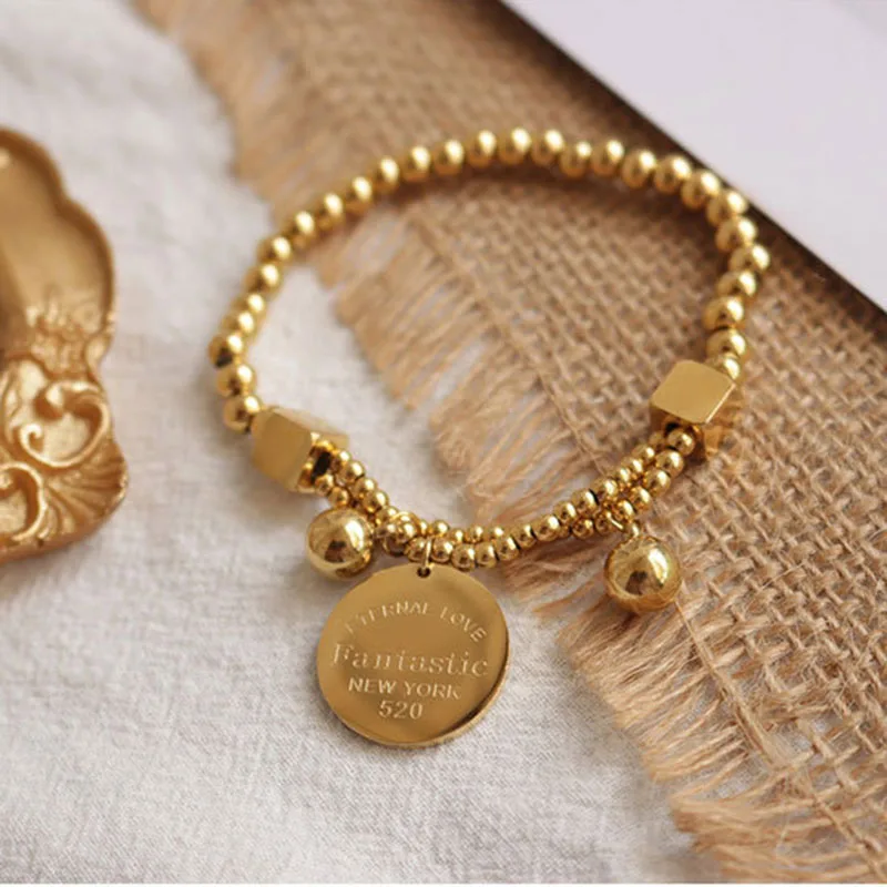 Elastic gold color beaded bracelet for women stainless steel wholesale coin letter disc charm bracelet fashion dainty 2020