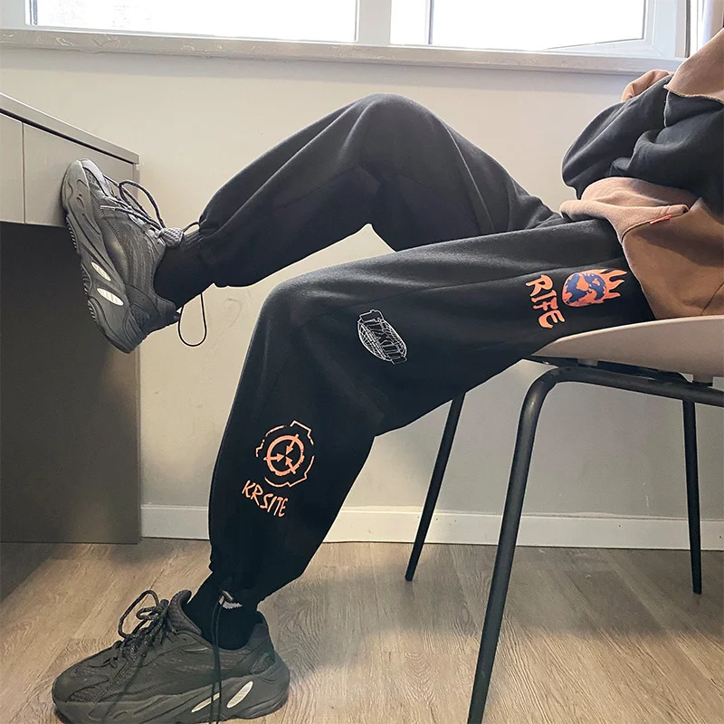 Spring and autumn men's casual pants trend large loose sports Capris printed drawstring Leggings streetwear joggers men