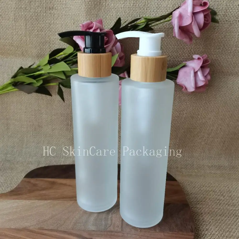 

Wholesale Frosted Clear Glass Skin Care Lotion Bamboo Pump Bottle Packaging, High Quality Cream/Shampoo Refillable Containers