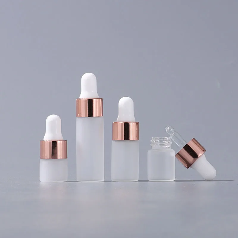 

360pcs/lot Factory Wholesale 1ml 2ml 3ml 5ml Frost Dropper Glass Rose Gold Cover e Liquid Essential Massage Oil Refillable Vial