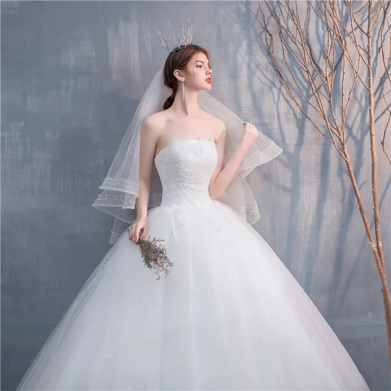 Abiti da sposa 2024 Abito da sposa semplice senza spalline per le donne Abito da sposa lungo fino al pavimento con lacci su misura Taglie forti Personalizzato