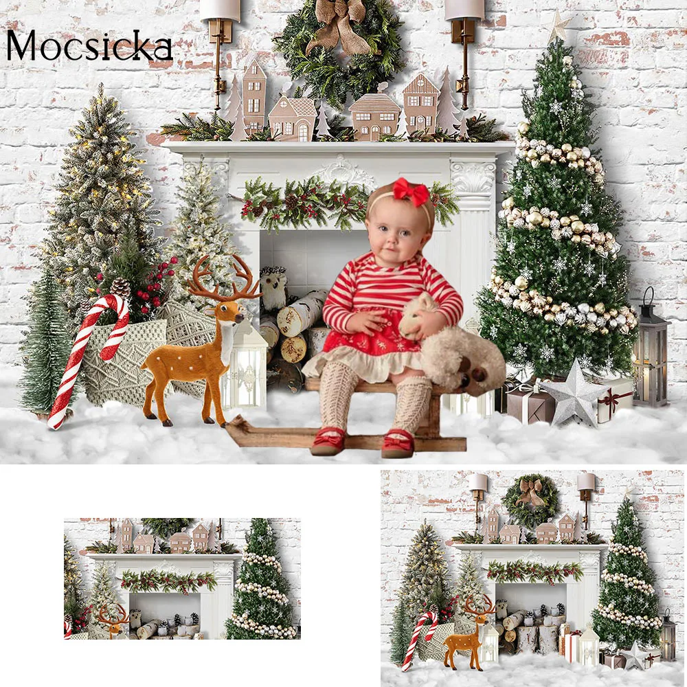 الشتاء الاطفال كعكة عيد ميلاد سحق التصوير الفوتوغرافي الطوب الأبيض شجرة عيد الميلاد الموقد خلفية الثلوج الهدايا لعبة الرنة صورة تبادل لاطلاق النار
