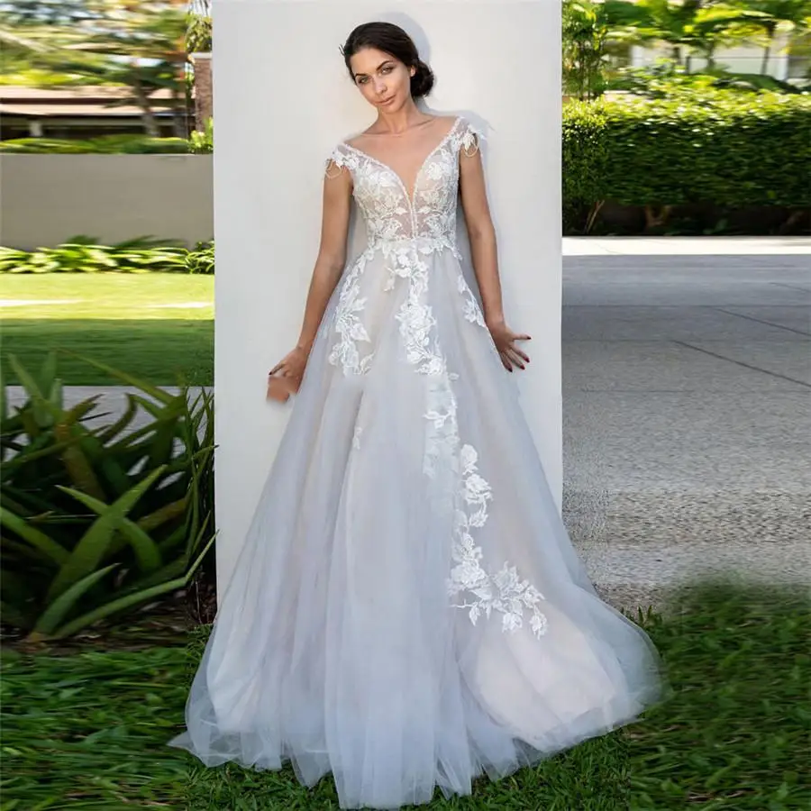 

Sheer V-neck Cap Sleeves A-line Tulle With Appliques Lace Wedding Dresses Abiti Da Sposa Sweep Train Bride Dress Vestidos