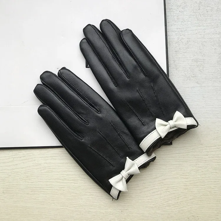 

Women's autumn winter small bow 100% genuine leather glove female natural leather black touchscreen riding driving glove R1785