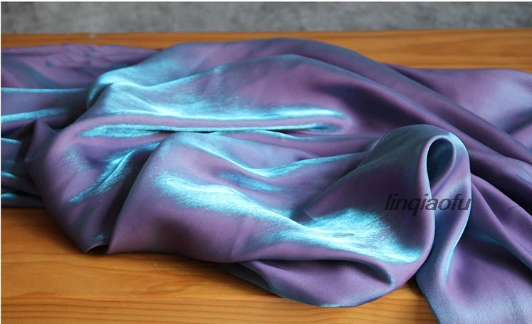 High-end dream purple blue crystal satin wedding dress bright mesh red cloth  Reflective cloth creative laser clothing fabric