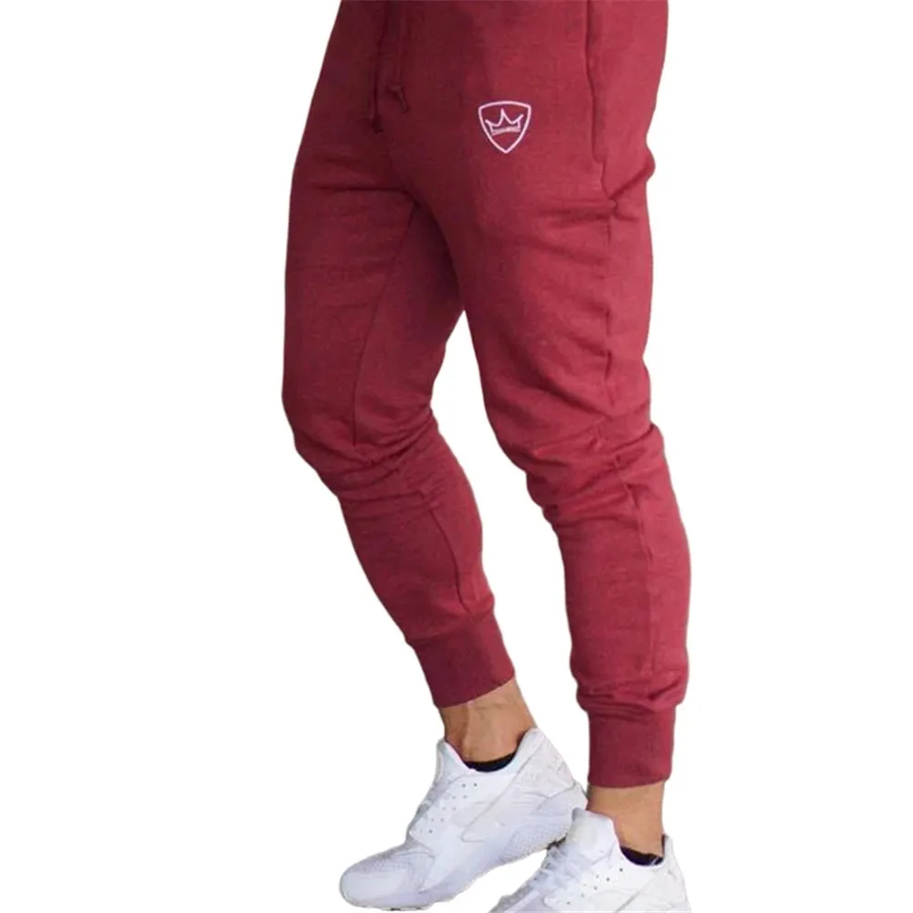 جوجرس الرجال أربعة مواسم Sweatpants الصلبة اللياقة البدنية رياضية تجريب السراويل الرباط سروال شكل قلم رصاص خفيفة الوزن بناطيل كاجوال