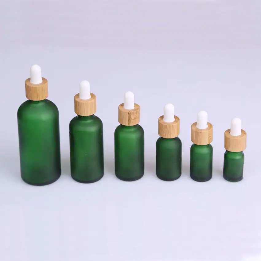 empty bottle 5ml 10ml 15ml transparent essential oil bottles with bamboo lid amber glass bottle engraving logo