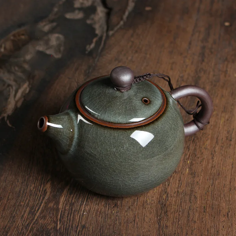 

Simple Celadon Handmade Iron Tire Teapot Ceramic Kung Fu Tea Set Ice Cracked Single Pot Ge Kiln With Filter Tea Maker LB80612