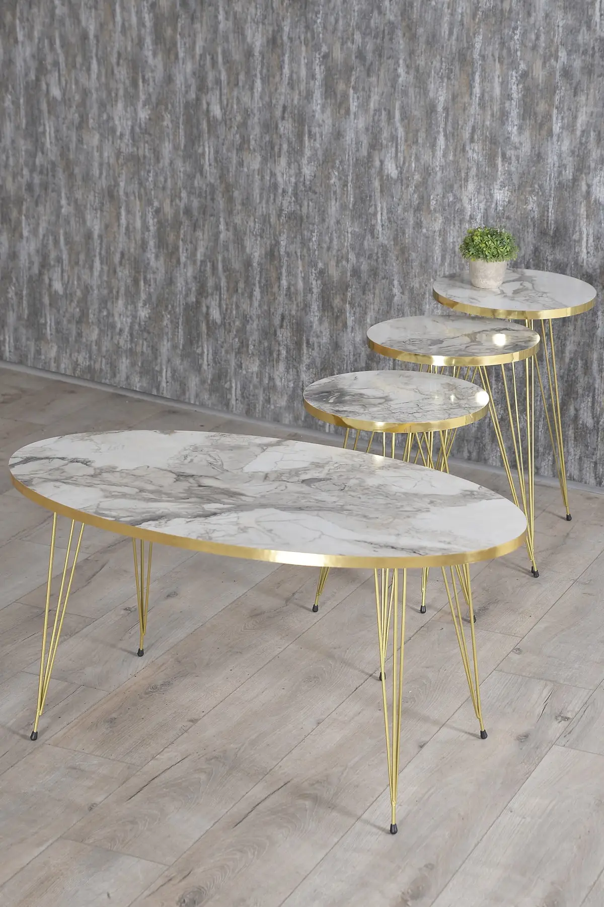 Zigon Coffee Table And Coffee Table in the Middle Ellipse Set Gold Ephesus Tel