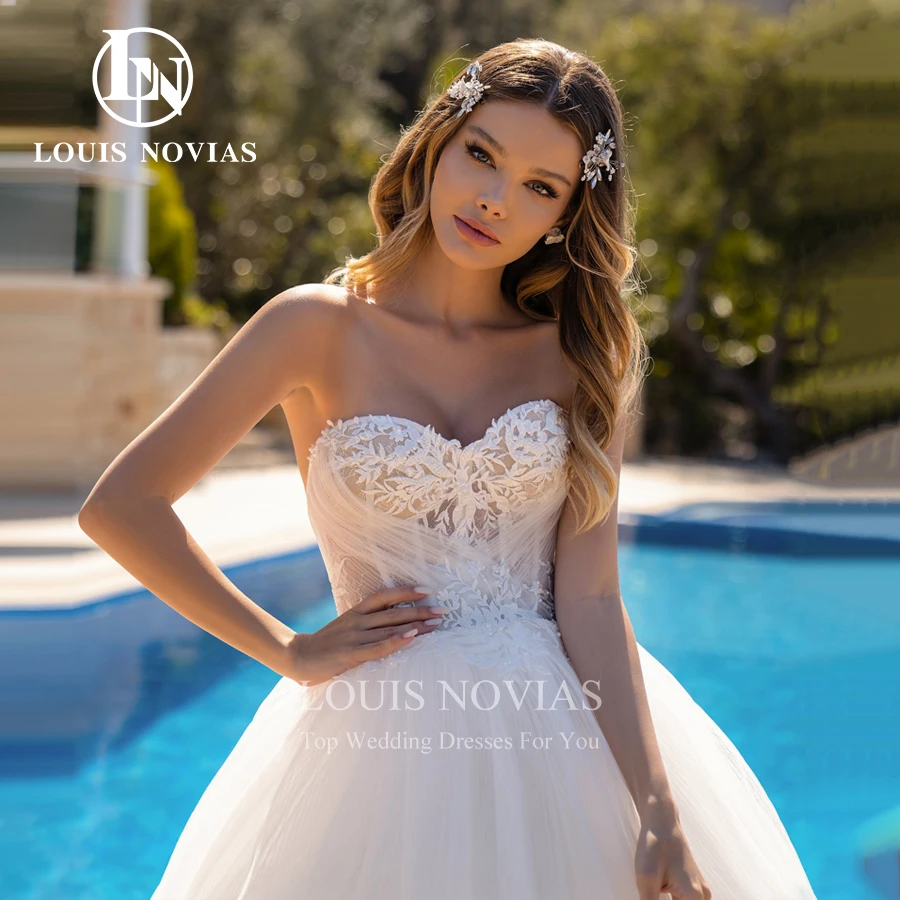 LOUIS NOVIAS فساتين زفاف على شكل حرف a للنساء مثير على شكل قلب وأكمام منتفخة قابلة للإزالة وكشكشة متدرجة مطرز بالخرز فستان زفاف بدون ظهر